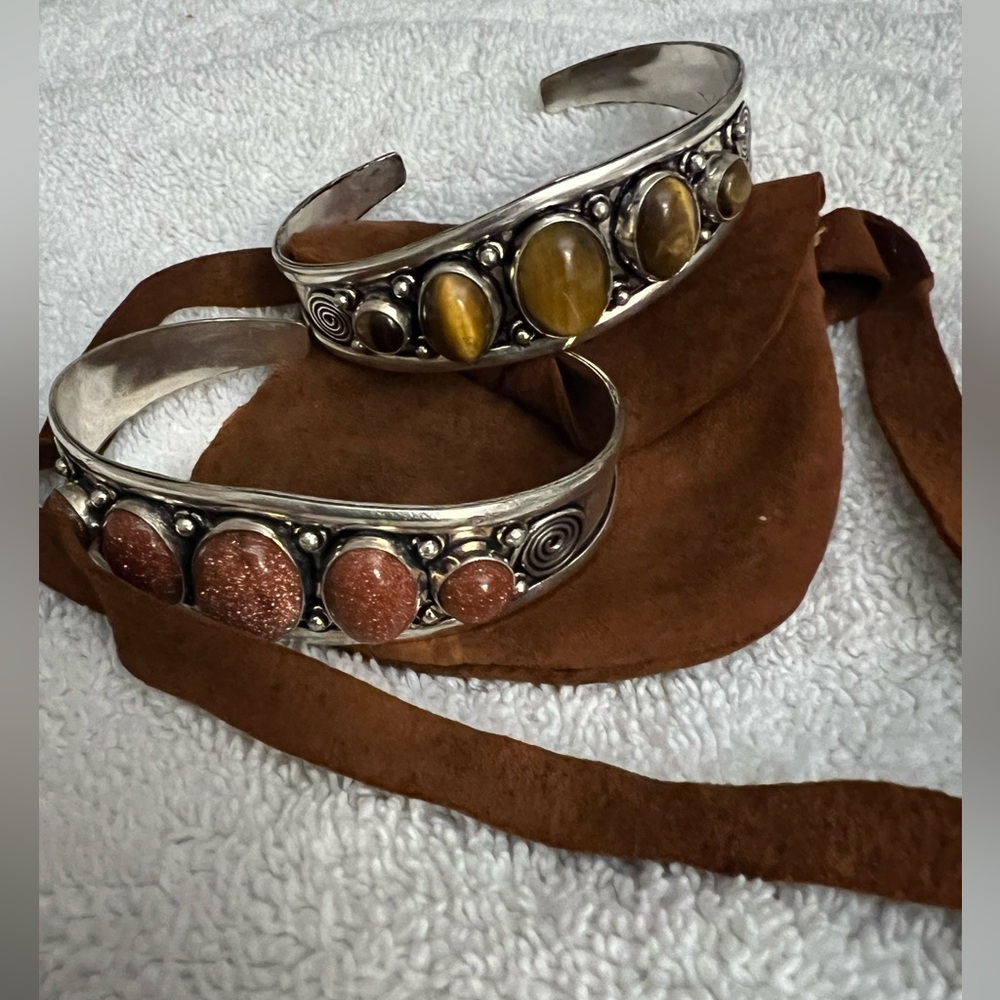 Two silver tone bracelets fashion jewelry